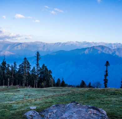 "Phulara Ridge trek panoramic view walking along the high Himalayan ridge at 12345 ft with sweeping meadows and snow peaks, Uttarakhand"