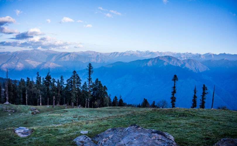 "Phulara Ridge trek panoramic view walking along the high Himalayan ridge at 12345 ft with sweeping meadows and snow peaks, Uttarakhand"