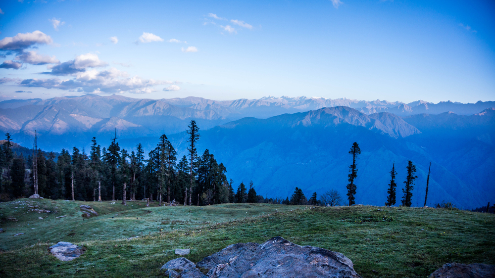 Phulara Ridge trek panoramic view walking along the high Himalayan ridge at 12345 ft with sweeping meadows and snow peaks, Uttarakhand