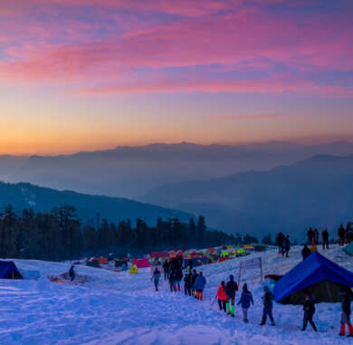 Bali Pass trek summit at 16,200 ft with panoramic views of Swargarohini, Bandarpunch and Black Peak over vast snowfields, Uttarakhand"