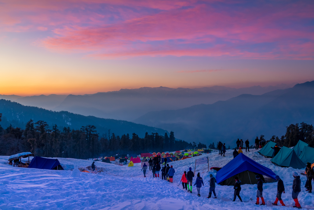 Bali Pass trek summit at 16,200 ft with panoramic views of Swargarohini, Bandarpunch and Black Peak over vast snowfields, Uttarakhand